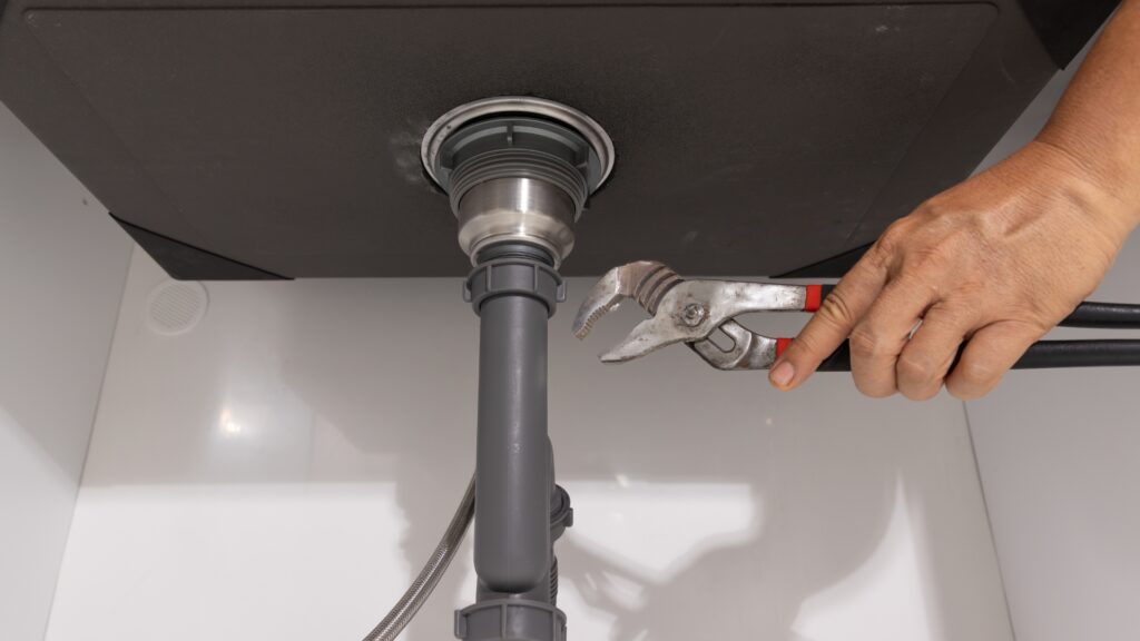 Safer drain cleaner safety alternatives including plunger and drain snake tools