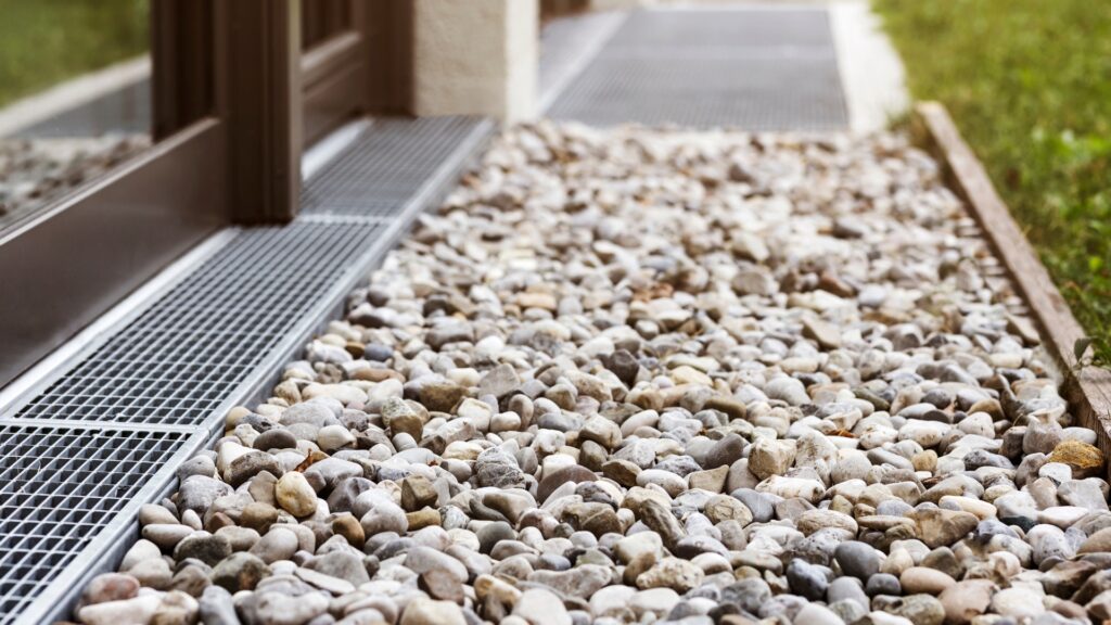 Water pooling in a garden before french drain installation